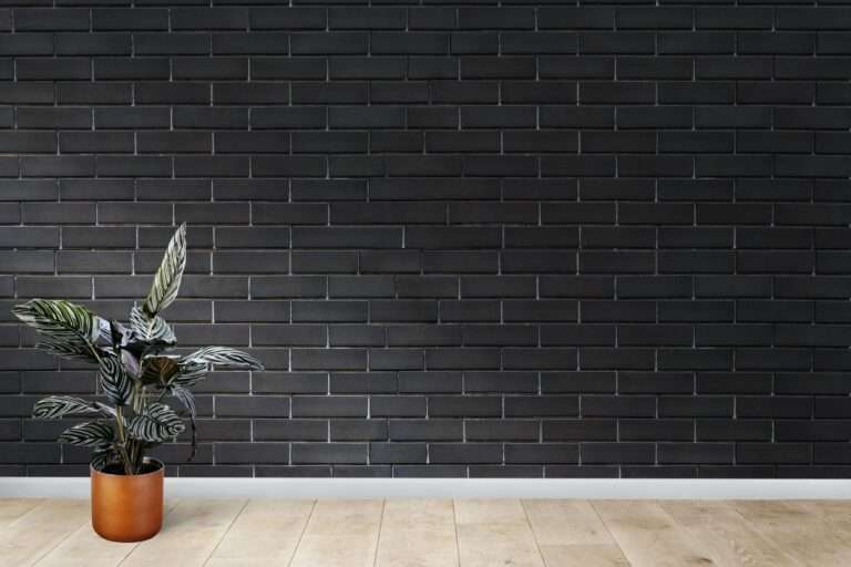 room-with-black-brick-wall-min