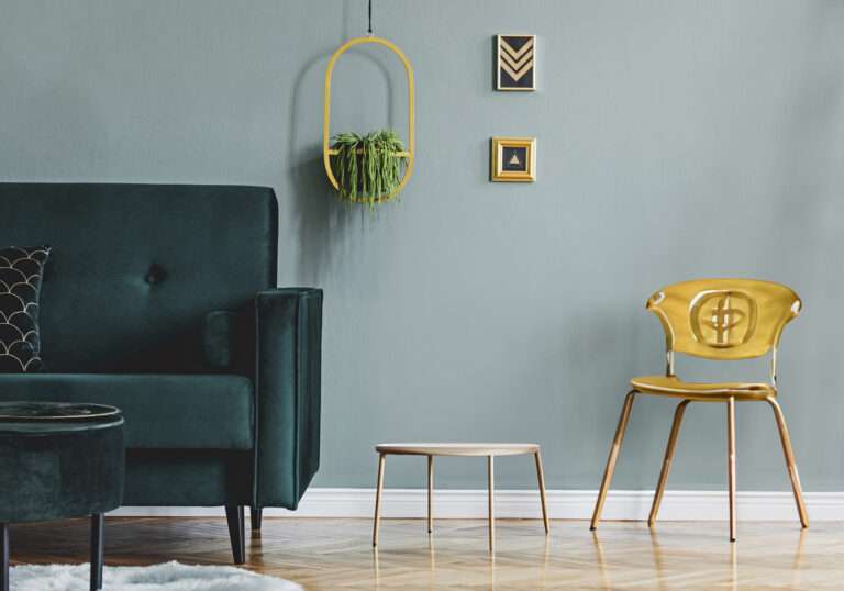 stylish-composition-luxury-apartment-living-room-interior-with-design-sofa-coffee-table-accessories-green-walls-wooden-parquet (1) copy-min